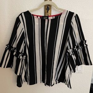 Medium black and white blouse. Super fun sleeves